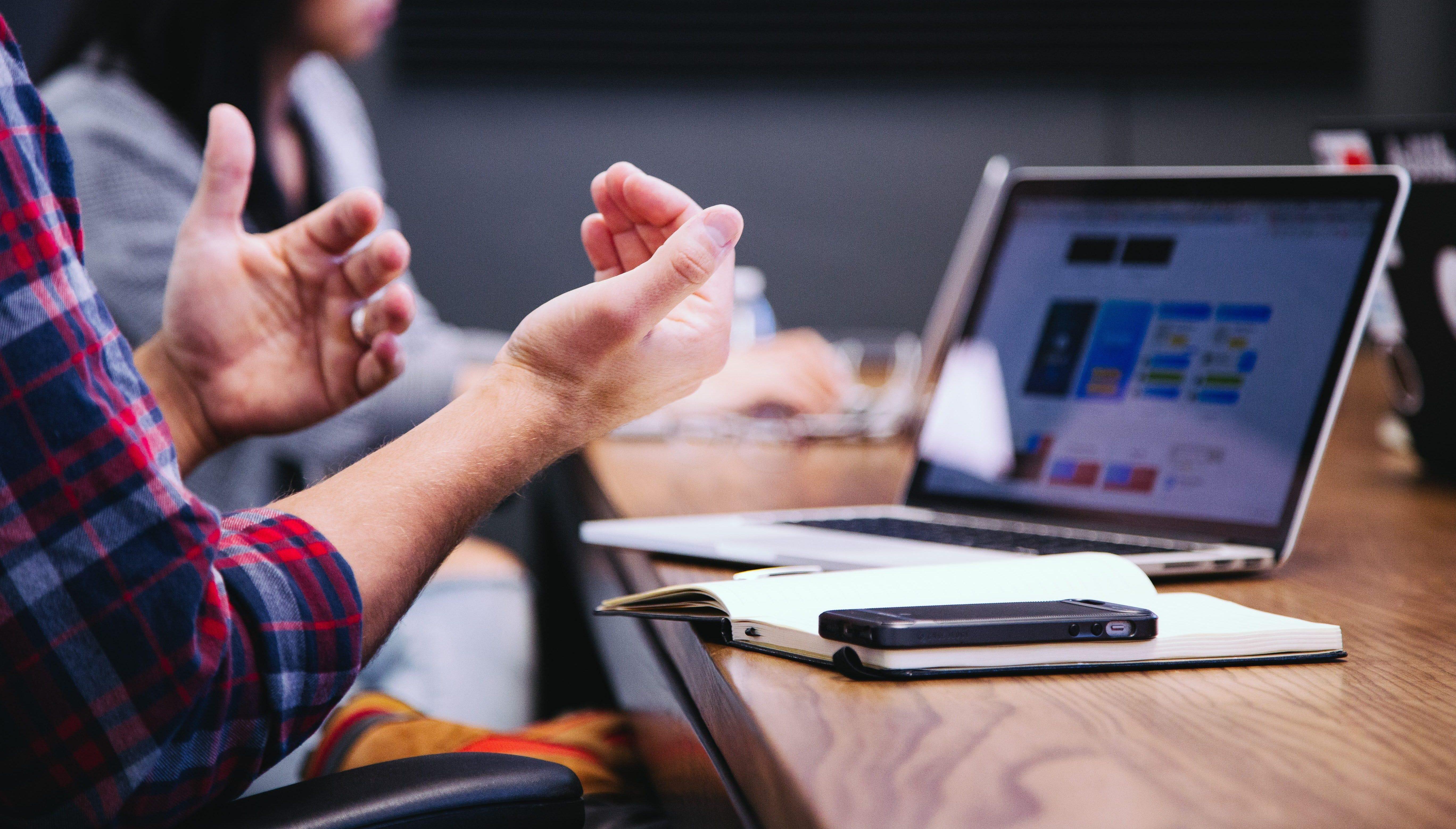 A user on a video call, interviewing a client and gathering feedback on the relationship